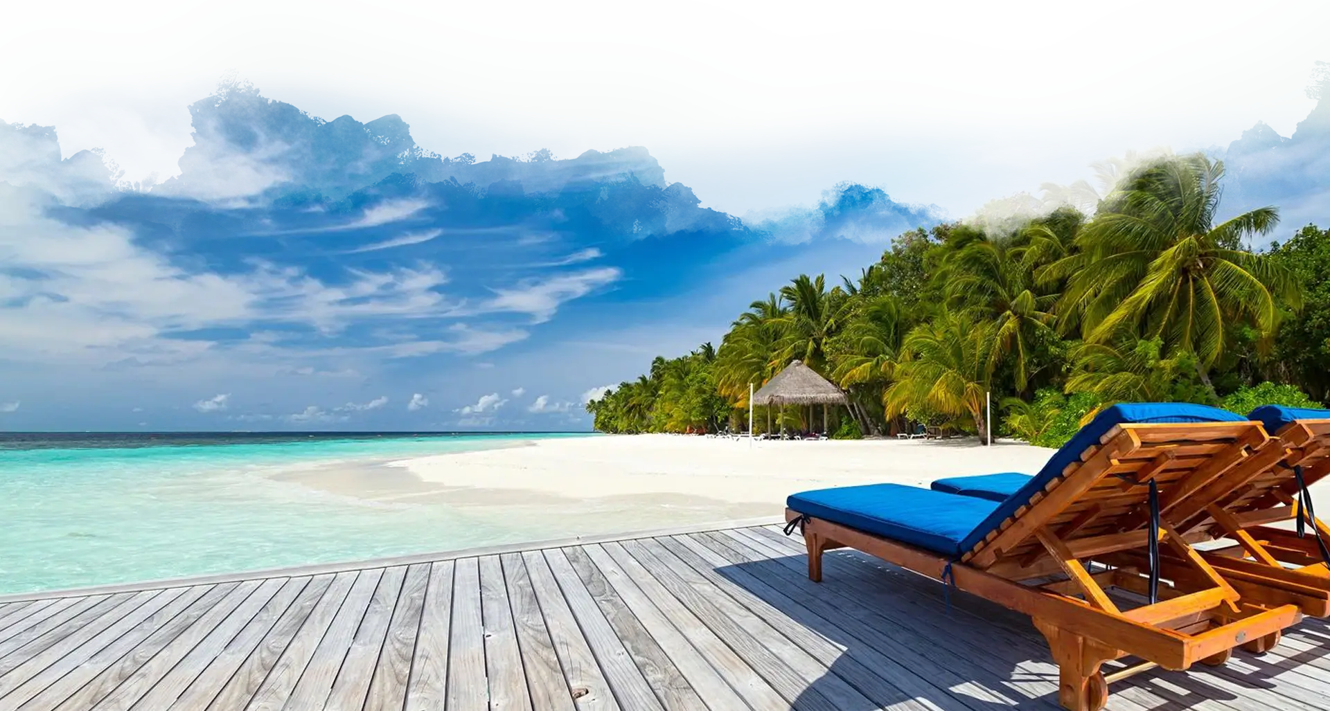 h2 A beach with two lounge chairs and an umbrella